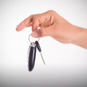 image of Close-up of a hand dangling car keys