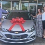 Sold car with member and sales people