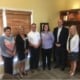 image of credit union staff and Senator Raatz