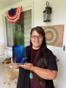 photo of Stephanie Harrison with CU philosophy award