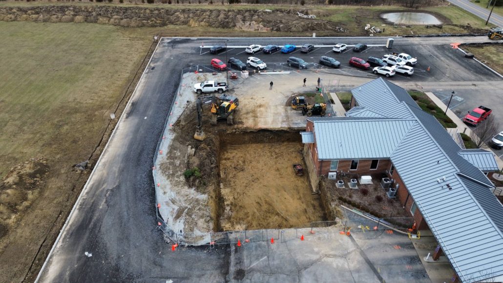 aerial view of building with new basement dug