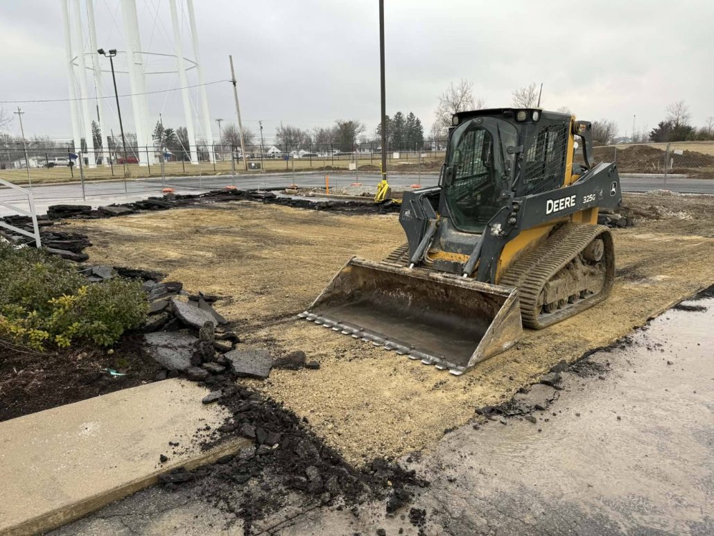 machine removing pavement