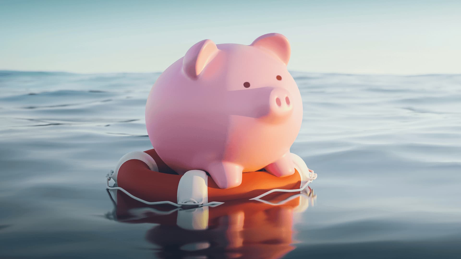 piggy bank on life raft in water