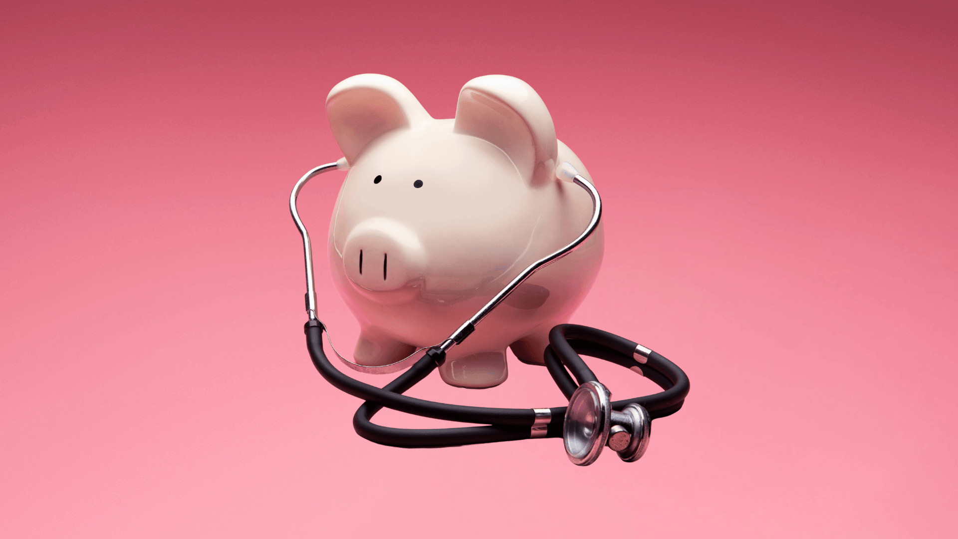 piggy bank listening to stethoscope