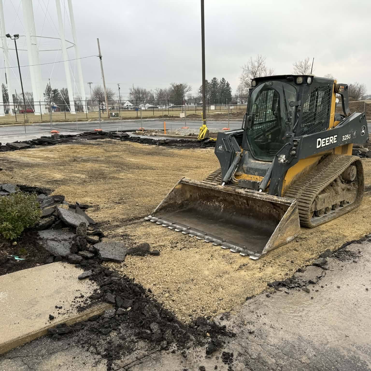 machine removing pavement