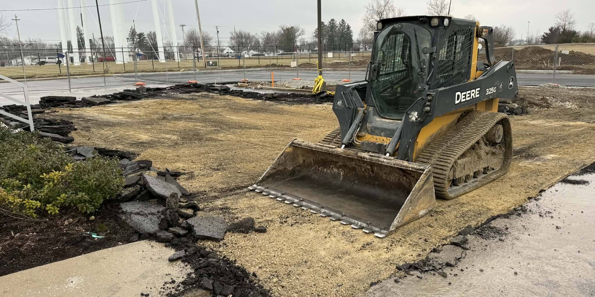 machine removing pavement