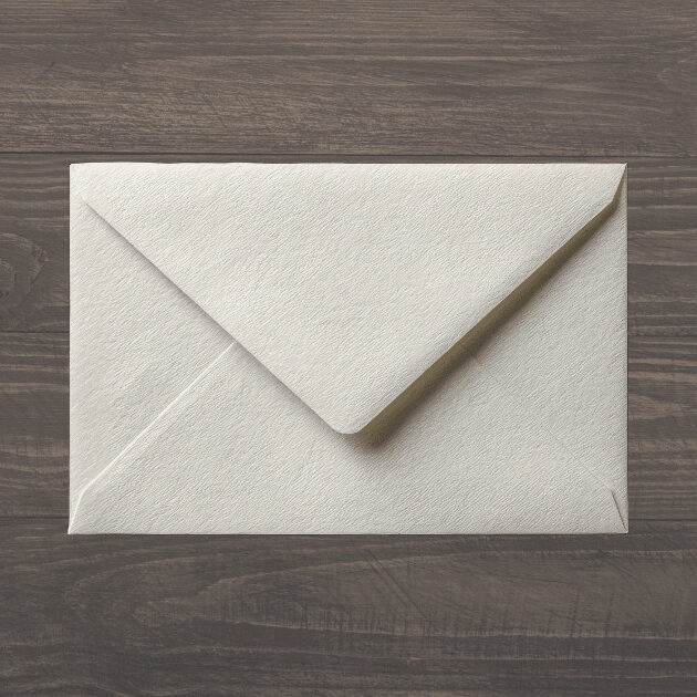 envelope on wooden background
