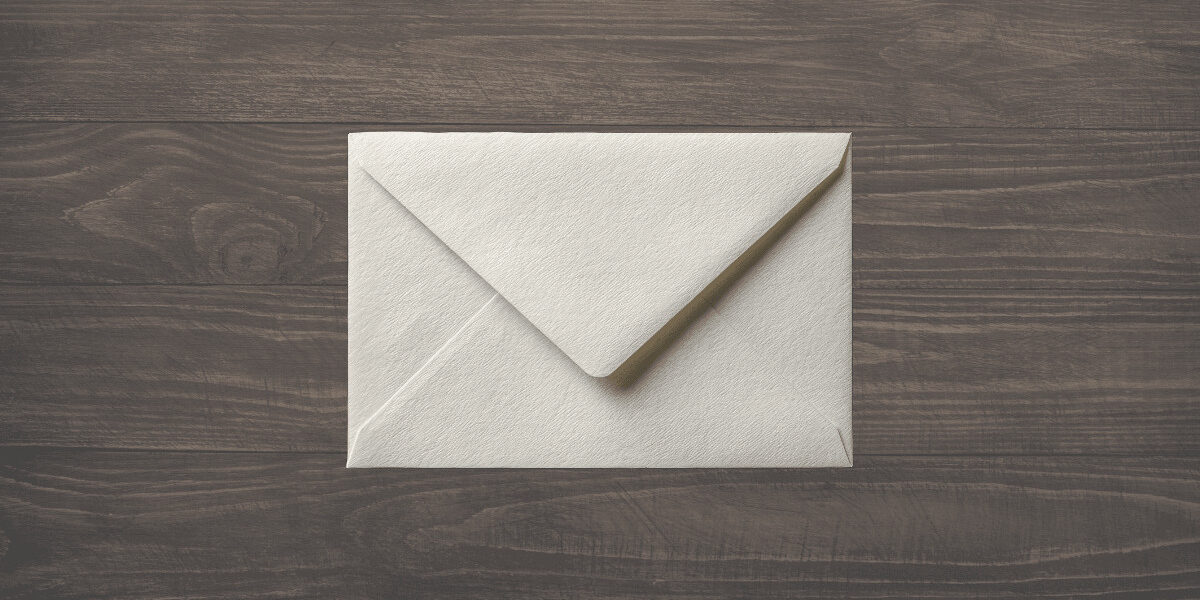 envelope on wooden background