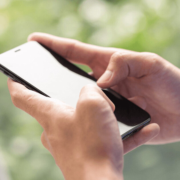 close up of person texting on phone