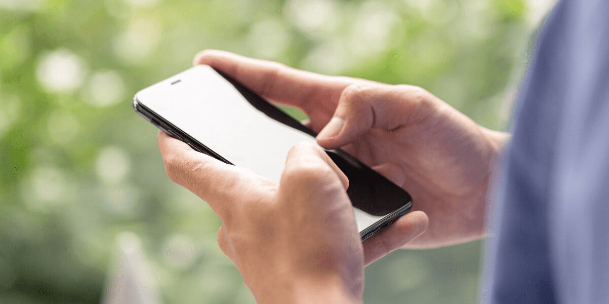 close up of person texting on phone